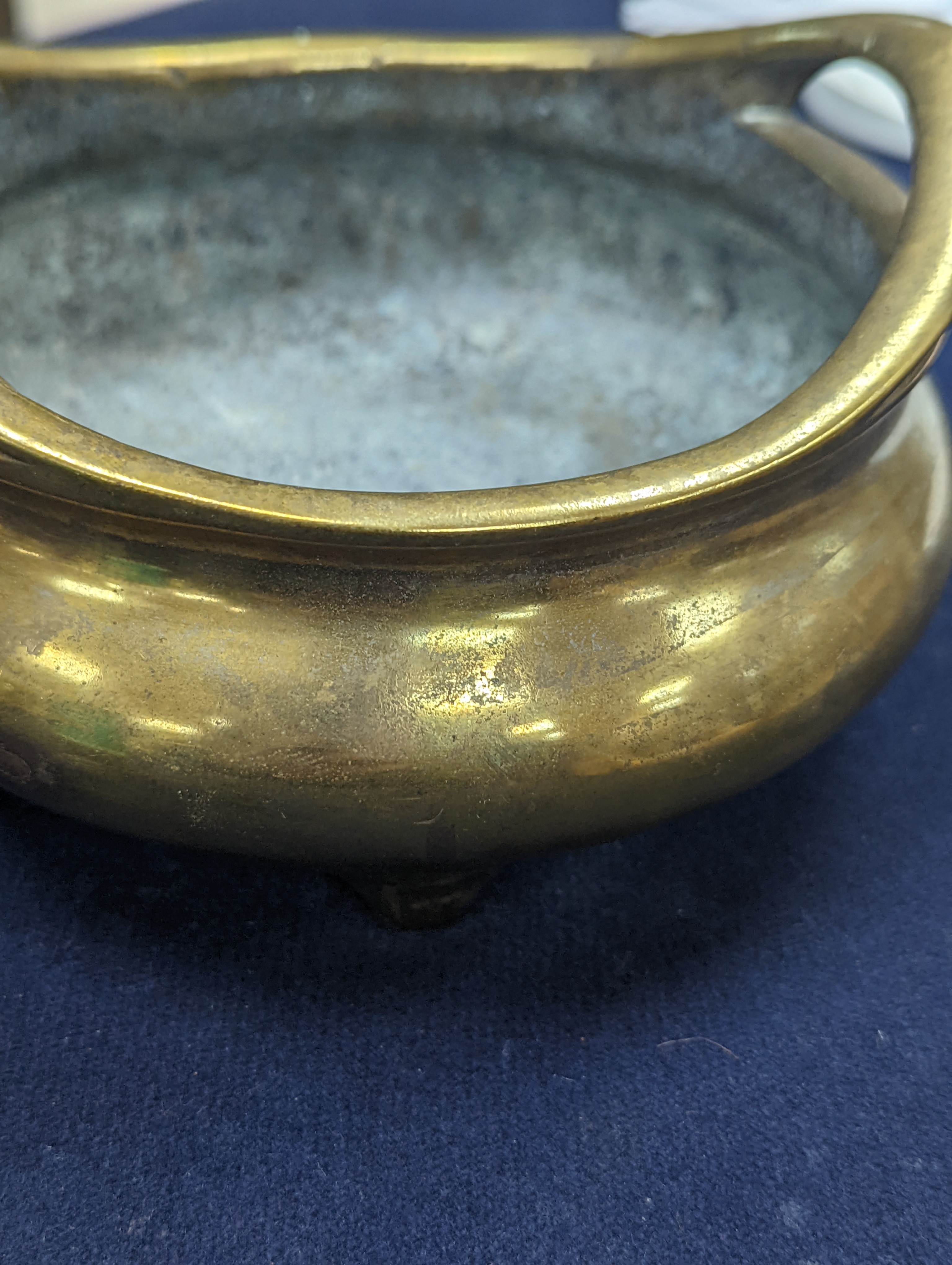 A Chinese bronze ding censer, Xuande sixteen character mark but 19th century, diameter 15cm